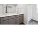 Spacious bathroom boasts a large vanity with contemporary fixtures and finishes at 19079 E 94Th Pl, Commerce City, CO 80022