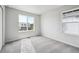 Bright bedroom boasts large windows that offer natural light and neighborhood views at 19079 E 94Th Pl, Commerce City, CO 80022