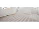 Large, carpeted bonus room with natural light at 19079 E 94Th Pl, Commerce City, CO 80022