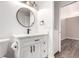 Bright bathroom featuring modern fixtures and vanity with black hardware at 720 16Th St # 207, Denver, CO 80202