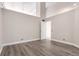 Large bedroom with natural light, white trim, and modern flooring at 720 16Th St # 207, Denver, CO 80202