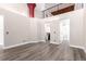 Bright bedroom showcasing loft area, closet, and bathroom access at 720 16Th St # 207, Denver, CO 80202
