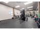 Well-equipped gym area features weight machines, free weights, and mirrors for a comprehensive workout at 720 16Th St # 207, Denver, CO 80202