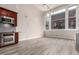 Bright living area featuring an updated kitchen and a large window with city views at 720 16Th St # 207, Denver, CO 80202