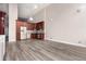 Spacious living area with updated kitchen, light gray flooring, and plenty of natural light at 720 16Th St # 207, Denver, CO 80202