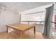 Loft space overlooking main living area with exposed ceilings and staircase at 720 16Th St # 207, Denver, CO 80202