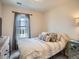 Cozy bedroom featuring a comfortable bed, neutral tones, and natural light at 13638 Garfield St # C, Thornton, CO 80602
