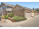 Well-maintained exterior of the home featuring stone accents and landscaping at 13638 Garfield St # C, Thornton, CO 80602
