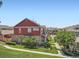 Scenic view of the townhome exteriors, landscaping, and pathways at 13638 Garfield St # C, Thornton, CO 80602