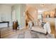 Inviting living room with hardwood floors, comfortable seating, and a staircase to the upper level at 13638 Garfield St # C, Thornton, CO 80602