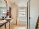 Bathroom with bathtub, shower, vanity and linen closet at 13638 Garfield St # C, Thornton, CO 80602