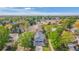 A charming home nestled among lush trees in a Gathering-friendly neighborhood close to a park and school at 6650 Stagecoach Ave, Firestone, CO 80504