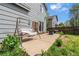 Backyard patio with a swing, grill, and privacy fence, perfect for outdoor entertaining and relaxation at 6650 Stagecoach Ave, Firestone, CO 80504