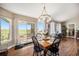 Bright dining area with sliding glass doors to the patio, offering great views and natural light at 2190 Coyote Creek Dr, Fort Lupton, CO 80621