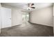 Comfortable carpeted bedroom with access to a private balcony at 5300 E Cherry Creek South Dr # 324, Denver, CO 80246