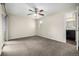 Spacious bedroom featuring carpet flooring and a window for natural light at 5300 E Cherry Creek South Dr # 324, Denver, CO 80246