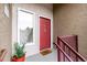 Inviting entrance with a red door, modern accents, and a well-maintained walkway at 5300 E Cherry Creek South Dr # 324, Denver, CO 80246