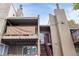 Townhome exterior with walkways, two levels, and patios overlooking the street at 5300 E Cherry Creek South Dr # 324, Denver, CO 80246