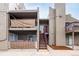 Townhome exterior with two levels and walkways, plus a glimpse of patios on the higher floors at 5300 E Cherry Creek South Dr # 324, Denver, CO 80246