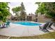 Community swimming pool and lounge area with ample seating for residents to relax and enjoy the outdoors at 5300 E Cherry Creek South Dr # 324, Denver, CO 80246