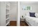 Bedroom with closet and hardwood floors at 475 S Eliot St, Denver, CO 80219
