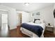 Cozy bedroom features hardwood floors, walk-in closet and natural light at 475 S Eliot St, Denver, CO 80219