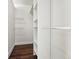 Walk-in closet provides ample storage with built-in shelving and hanging rods at 475 S Eliot St, Denver, CO 80219