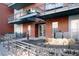 Inviting brick building entrance with manicured landscaping and convenient pedestrian access at 1440 Little Raven St # 107, Denver, CO 80202
