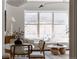 Well-lit living room with a large window, modern furniture, and stylish decor at 1440 Little Raven St # 107, Denver, CO 80202