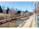 Scenic waterfront view with trees along the bank at 1440 Little Raven St # 107, Denver, CO 80202