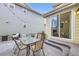 Outdoor living space with stamped concrete patio, dining and outdoor grill at 9113 E 36Th Ave, Denver, CO 80238