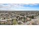 Wide aerial shot showcasing the neighborhood's expanse, dotted with trees and classic homes at 6576 S Lincoln St, Centennial, CO 80121