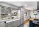 Bright kitchen featuring ample natural light, modern cabinets, a gas stove, and backyard views at 6576 S Lincoln St, Centennial, CO 80121