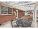 Covered patio area with outdoor seating perfect for relaxing and entertaining guests at 6576 S Lincoln St, Centennial, CO 80121