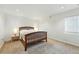 Bedroom featuring carpet, recess lighting, a window, and wooden bed frame with a side table at 9265 Buttonhill Ct, Highlands Ranch, CO 80130