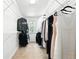 Walk-in closet with ample hanging space and shelving for organized storage of clothing at 9265 Buttonhill Ct, Highlands Ranch, CO 80130