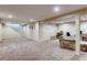 Spacious finished basement with carpet flooring perfect for a recreational or entertainment area at 2964 S Akron St, Denver, CO 80231
