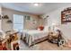 Comfortable bedroom with carpet flooring, natural light, and room for a desk and storage at 2964 S Akron St, Denver, CO 80231