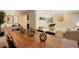 Open-concept dining area flows into the living room, offering a seamless entertainment space at 2964 S Akron St, Denver, CO 80231