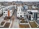 Residential area with modern townhomes and a view of the Denver skyline in the background at 1810 Julian St # 105, Denver, CO 80204
