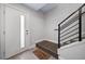 Modern entryway with staircase and frosted glass door at 1810 Julian St # 105, Denver, CO 80204