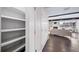 Hallway with built-in shelving and access to living spaces at 1810 Julian St # 105, Denver, CO 80204