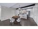 Modern kitchen with island and dining area, perfect for entertaining at 1810 Julian St # 105, Denver, CO 80204