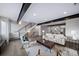 Spacious living room showcasing an open floor plan and city views at 1810 Julian St # 105, Denver, CO 80204