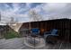 Cozy outdoor patio with seating area and a fenced-in yard perfect for relaxation at 2283 S Bannock St, Denver, CO 80223