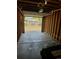 Spacious two-car garage with an open door showcasing the exterior and yard at 2283 S Bannock St, Denver, CO 80223