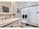 Modern bathroom with sleek vanity, glass-enclosed shower, and stylish tile accents at 8625 E 125Th Ct, Thornton, CO 80602
