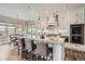 Modern kitchen featuring a large island, granite countertops, and stainless steel appliances at 8625 E 125Th Ct, Thornton, CO 80602