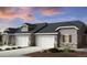 Charming single Gathering home with a three-car garage and beautiful stone accents at 3381 N Denali St, Aurora, CO 80019