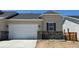 Charming single-Gathering home boasts a two-car garage and stone accents on the exterior, creating a modern look at 3381 N Denali St, Aurora, CO 80019